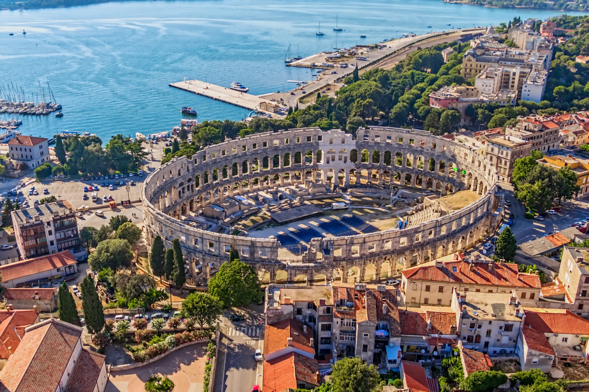 Aerial view of the Pula Arena, with the surrounding cityscape in Pula, Croatia